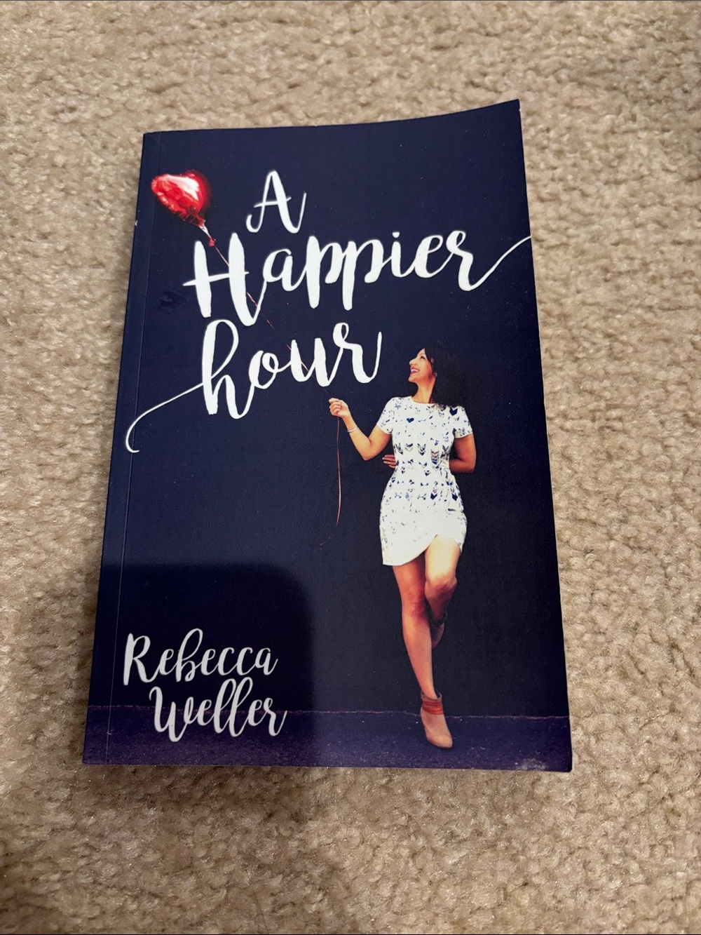 A Happier Hour by — Navy Cover with Red Balloon